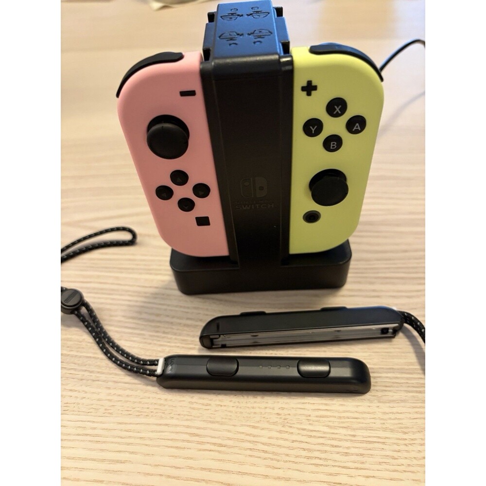 Nintendo Switch Joy-Con Controllers Neon Pink Yellow Charging Dock Wrist Straps